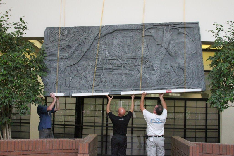 Illustration for article titled Skyrim's Giant Dragon Wall, Installed on a Regular Office Wall
